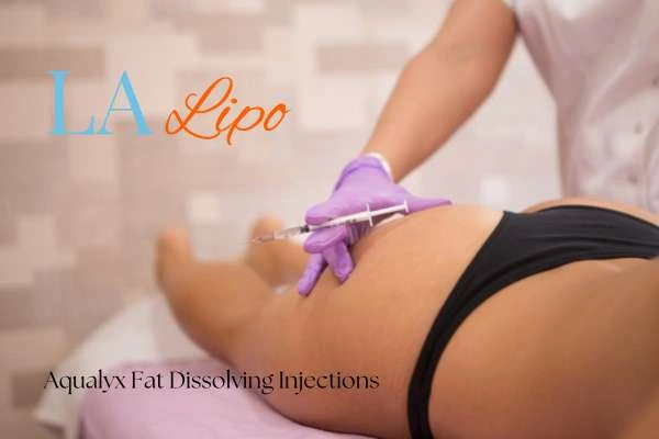Woman having fat dissolving injections Watford on thighs