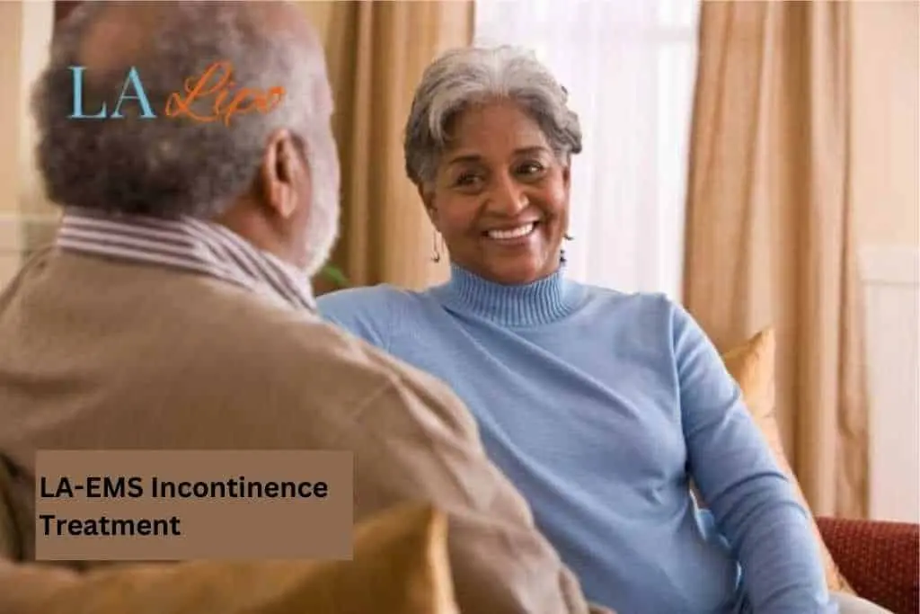 Couple sat smiling at each other - LA-EMS treatment Watford