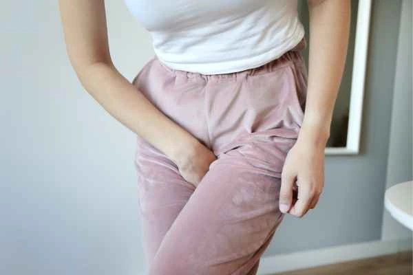 woman struggling with urine incontinence Watford